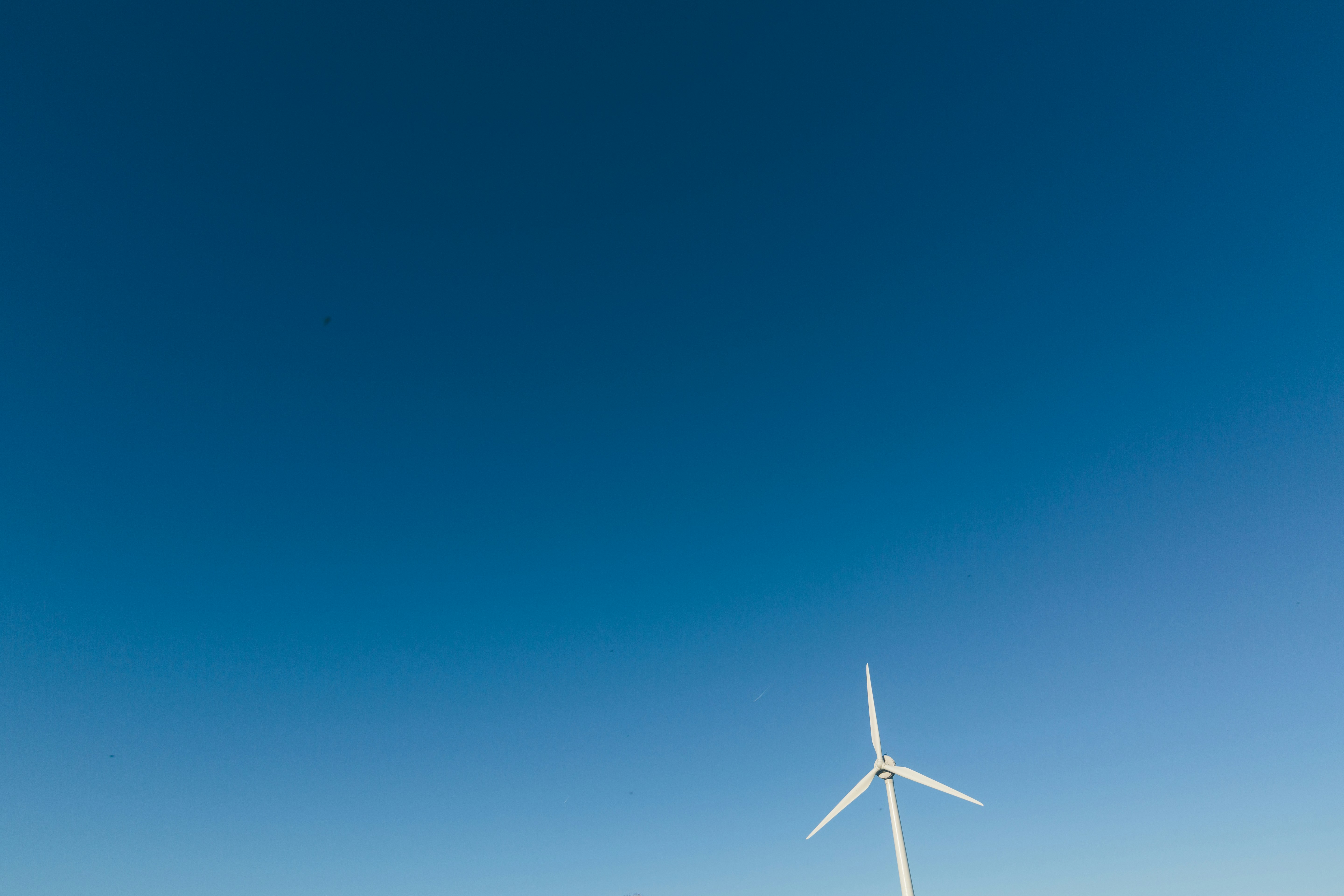 📝 Conclusion: Why Renewable Energy Is Our Future by Gone Greenish photo of white wind turbine during daytime
