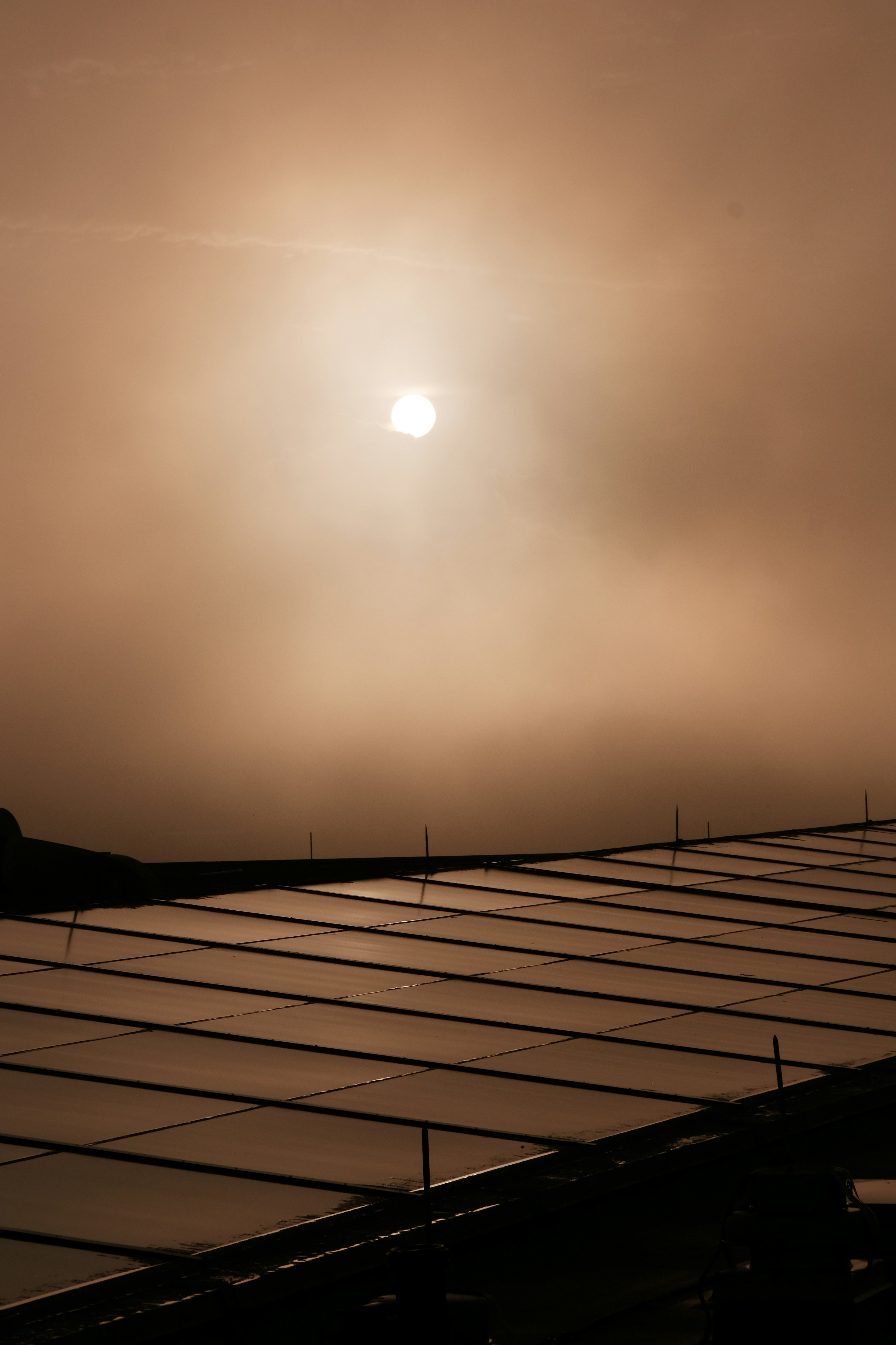 🎉 Conclusion: Embrace the Sun, Embrace the Future! by Gone Greenish the sun is shining through the clouds over a building