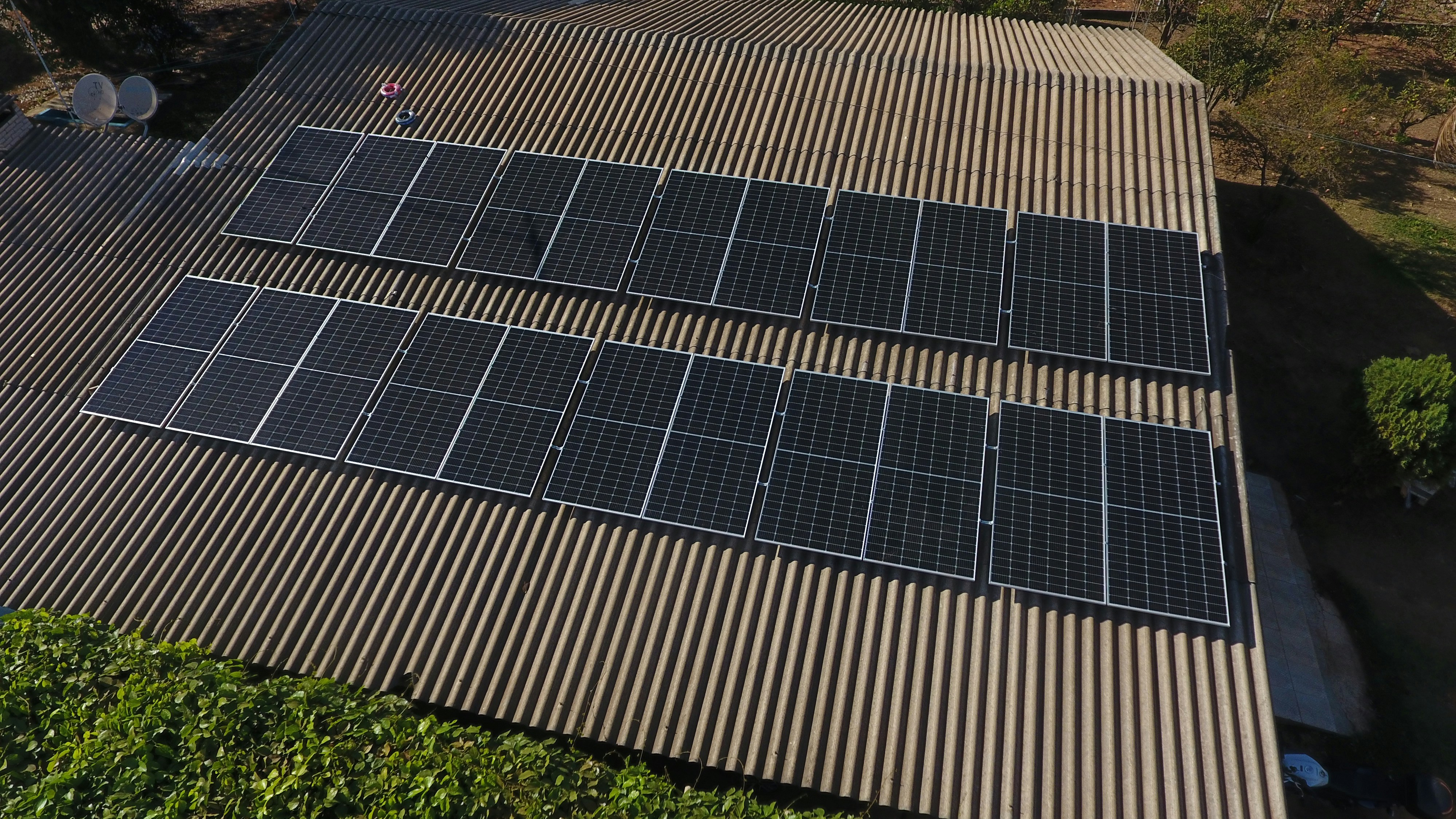 Solar panels are installed on a rooftop.