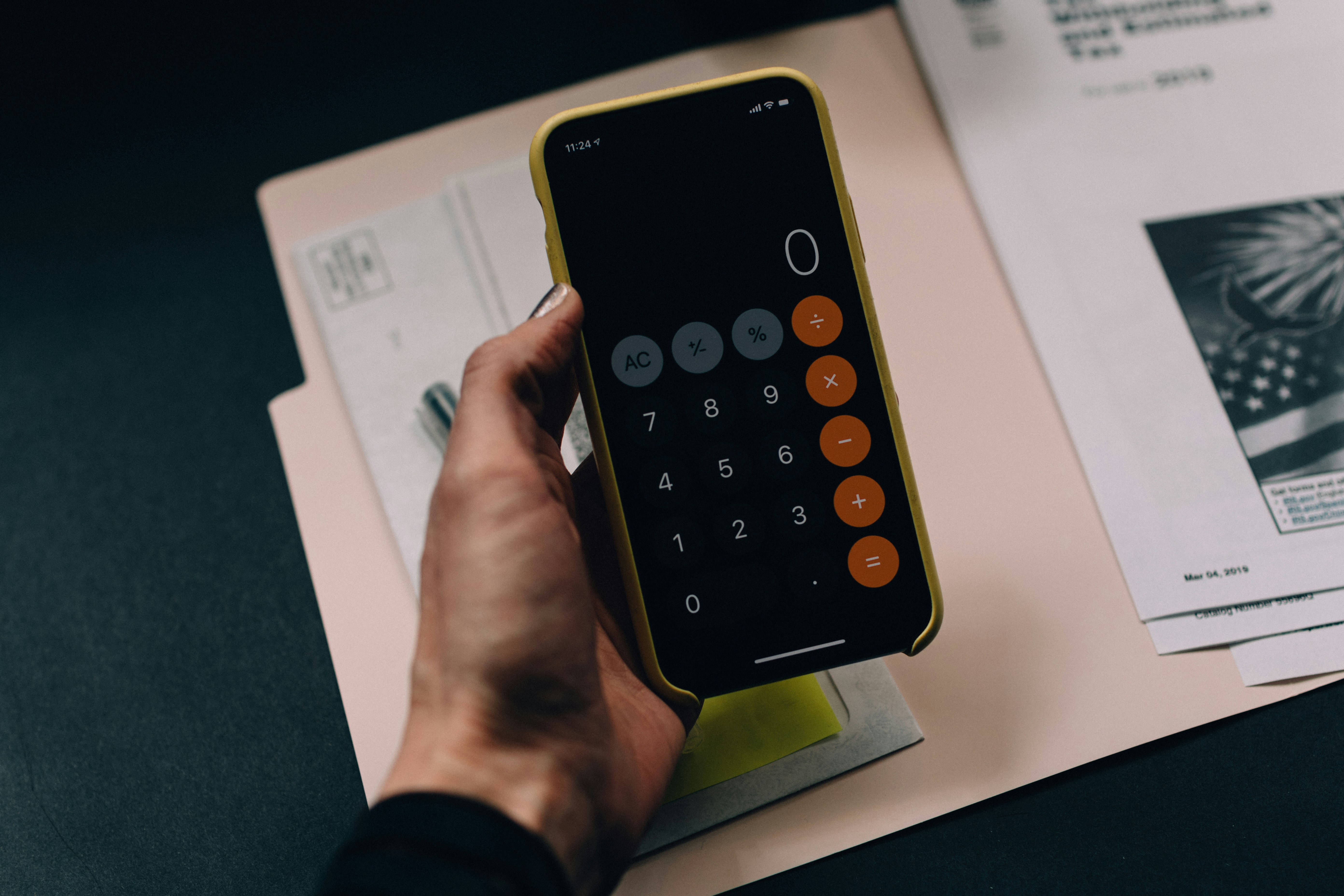 đ The Evolution of Eco-Metrics: A Brief History of Carbon Footprint Calculators by Gone Greenish black Android smartphone
