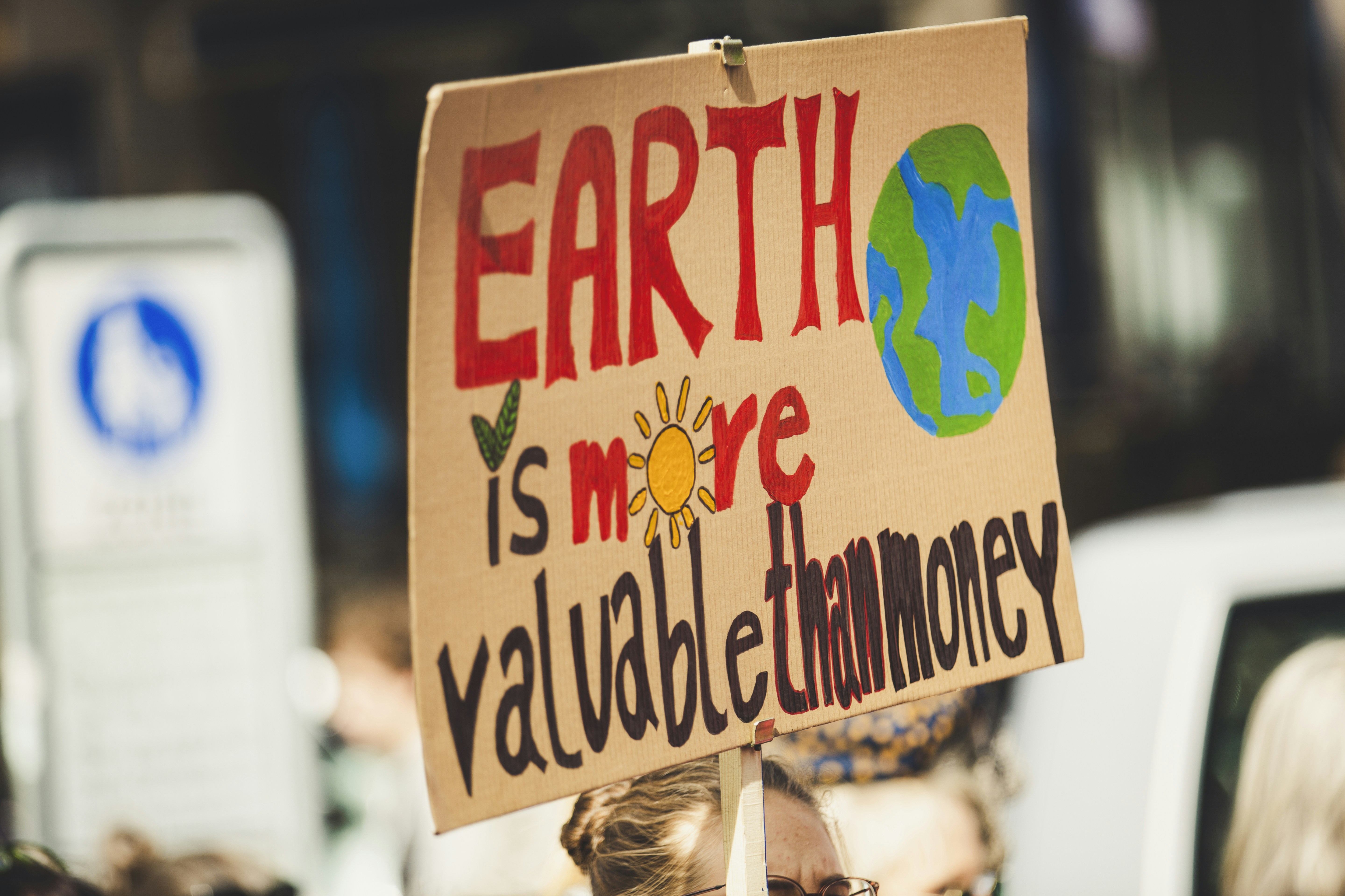 EARTH IS MORE VALUABLE THAN MONEY. Global climate change strike - No Planet B - 09-20-2019 by Gone Greenish Earth is more valuable than money signage
